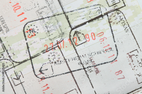 Photo: Immigration stamps on passport page Immigration stamps on passport page