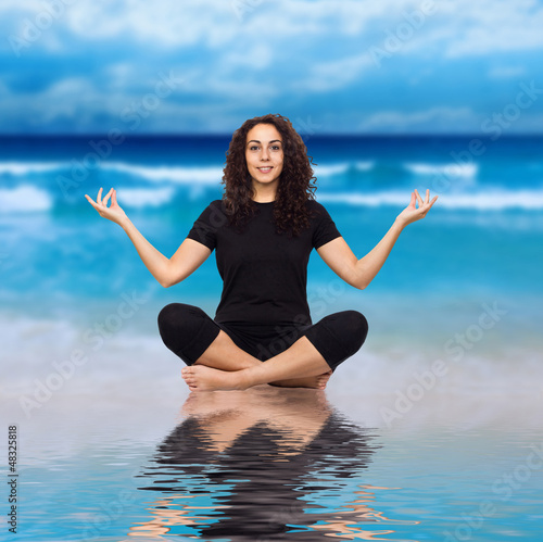 Photo: Brunette Woman Doing Yoga Exercises Brunette Woman Doing Yoga Exercises