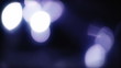Moving blue bokeh background.