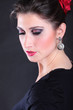 closeup portrait of flamenco dancer fan