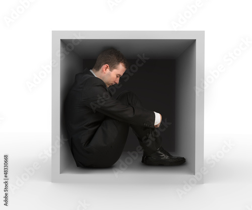 Photo: Businessman in a box Businessman in a box