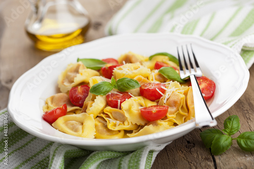 Photo: tortellini with cheese and tomatoes tortellini with cheese and tomatoes