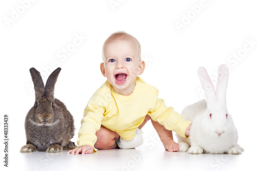 Photo: baby and rabbits baby and rabbits