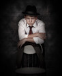 Photo: Portrait looking danger detective man Portrait looking danger detective man