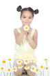 Little girl with daisies on white