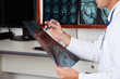 Radiologist Holding X-ray