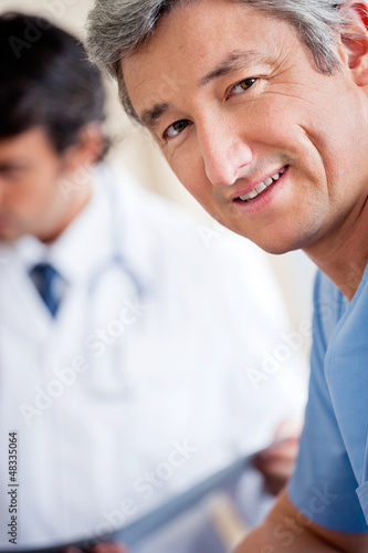Photo: Mature Male Doctor Smiling Mature Male Doctor Smiling