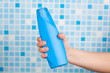 hand holding shower gel