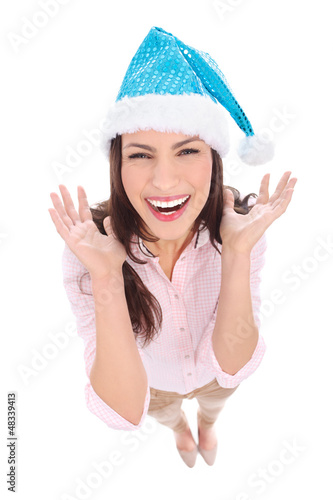 Photo: Happy woman in Santa hat Happy woman in Santa hat