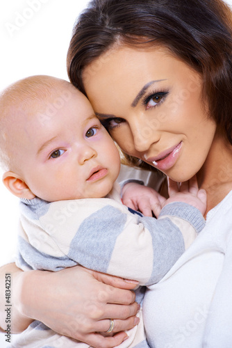 Photo: Cute little baby with Mum Cute little baby with Mum