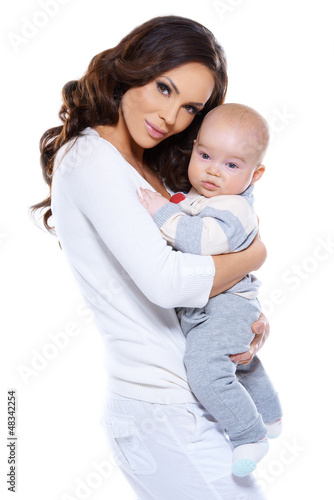 Photo: Beautiful loving mother and baby Beautiful loving mother and baby