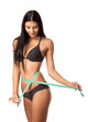 Photo: Happy young woman with measuring tape Happy young woman with measuring tape
