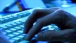Typing on keyboard.