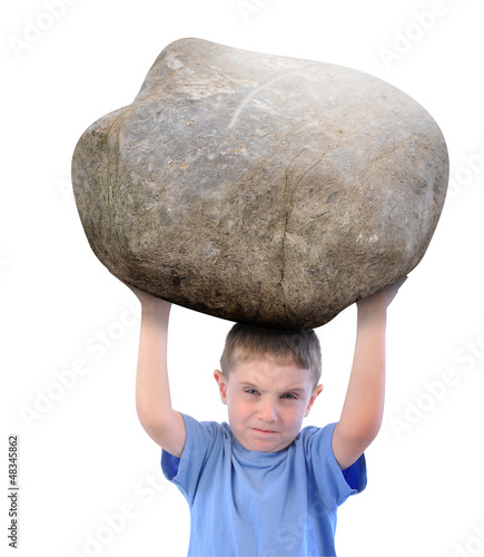 Photo: Boy with Stress Holding a Rock Boy with Stress Holding a Rock
