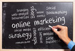 business man writing the online marketing  concepts