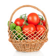 Photo: Basket of tomatoes and cucumbers. Fresh vegetables Basket of tomatoes and cucumbers. Fresh vegetables