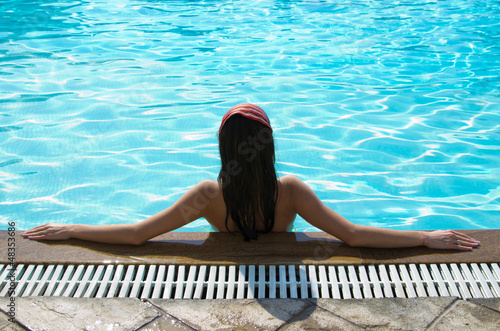 Photo: woman in pool woman in pool