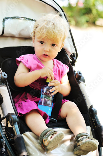 Photo: baby girl in pram baby girl in pram