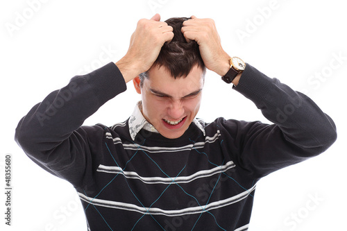 Photo: Young handsome man have a headache Young handsome man have a headache