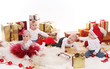 Photo: Babies with gifts celebrate Christmas Babies with gifts celebrate Christmas