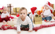 Photo: Babies with gifts celebrate Christmas Babies with gifts celebrate Christmas