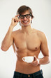 Funny portrait of young naked man