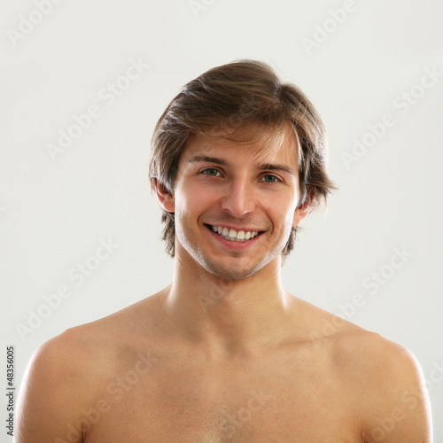 Photo: Young beautiful man with naked torso Young beautiful man with naked torso