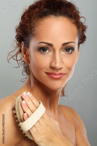 Photo: Beautiful natural middle aged woman massage Beautiful natural middle aged woman massage