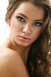 Young latino woman with curls