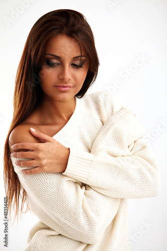 Photo: Beautiful calm brunette isolated Beautiful calm brunette isolated