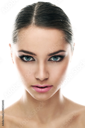Photo: Young latino woman with tail isolated Young latino woman with tail isolated
