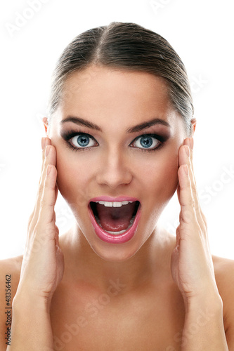 Photo: Young beautiful latino woman surprised Young beautiful latino woman surprised