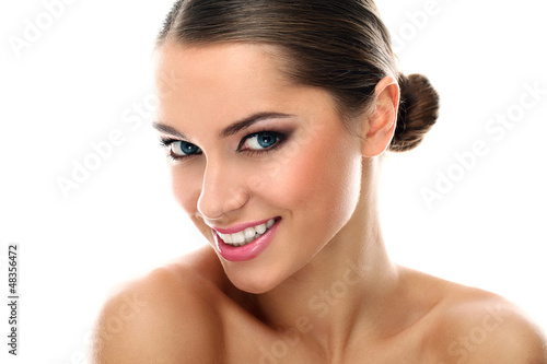 Photo: Young latino woman smiling isolated Young latino woman smiling isolated