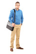 Photo: Full length portrait of a young man with a shoulder bag Full length portrait of a young man with a shoulder bag