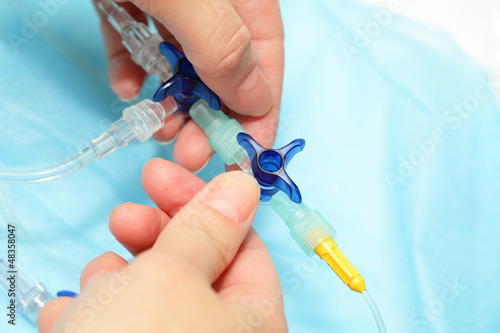 Photo: Manipulation of the plastic valve. Medicine. Science. Manipulation of the plastic valve. Medicine. Science.
