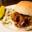 Pulled pork sandwich, coleslaw and pickle