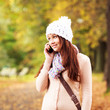Beautiful young girl talking on cell phone. Beautiful Teenager