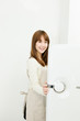 Beautiful asian woman in the kitchen