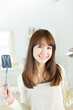 Beautiful asian woman in the kitchen