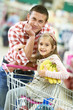 Family shopping in supermarket