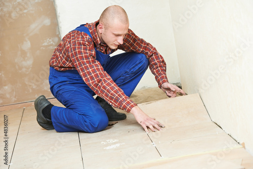 Photo: tiler at home floor tiling renovation work tiler at home floor tiling renovation work