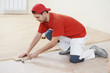 carpenter worker joining parket floor