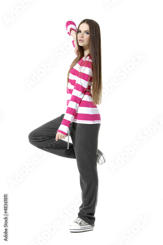 Photo: fashionable woman in colorful dress posing fashionable woman in colorful dress posing