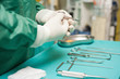 Surgeon choosing a surgical instrument