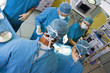Photo: High angle view of a group of surgeons High angle view of a group of surgeons
