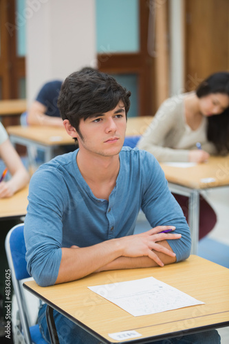 Photo: Student looking up during exam Student looking up during exam