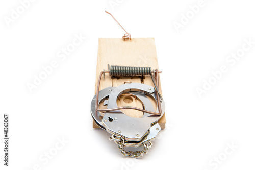 Photo: Handcuffs at a mousetrap Handcuffs at a mousetrap