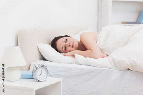 Photo: Young woman in bed Young woman in bed
