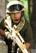 Soldier with a rifle moving out