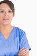 Portrait of smiling nurse with arms crossed